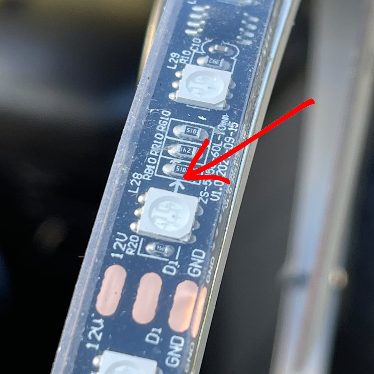 Arrow showing direction of flow of LED strip